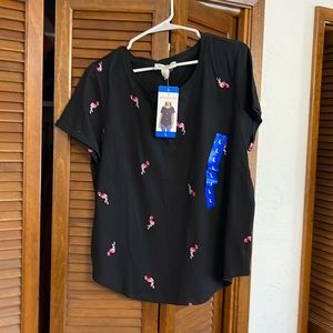 Black tee with embroidered flamingos